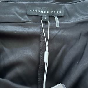 Black sequin skort endless rose. Size small